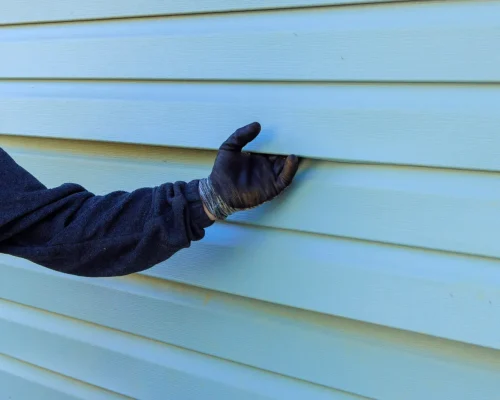 During,Exterior,House,Remodel,Reconstruction,Of,House,,Damaged,Plastic,Siding During,Exterior,House,Remodel,Reconstruction,Of,House,,Damaged,Plastic,Siding